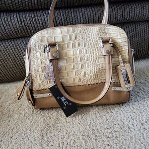 M.C. leather cream and brown crossbody bag